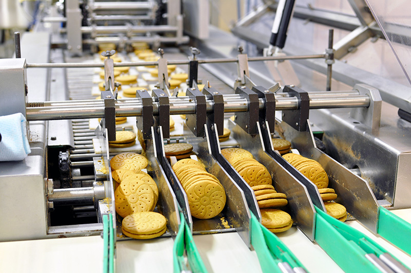 Conveyor,Belt,With,Biscuits,In,A,Food,Factory,-,Machinery